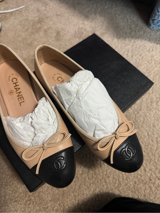 CHANEL Shoes - CHANEL Beige Leather Ballet Flats with Black Cap Toe